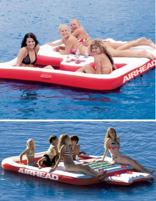 Kids sitting and enjoying the lake on this airhead cool island inflatable raft. It's more like a sun deck to lie down and dive from.