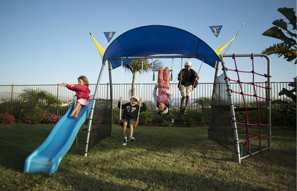 For active kids, this is a great playset. It's not just a swing and a slide, it also has a sprayer that you can attach to a hose in the summer. What a great way to keep cool.